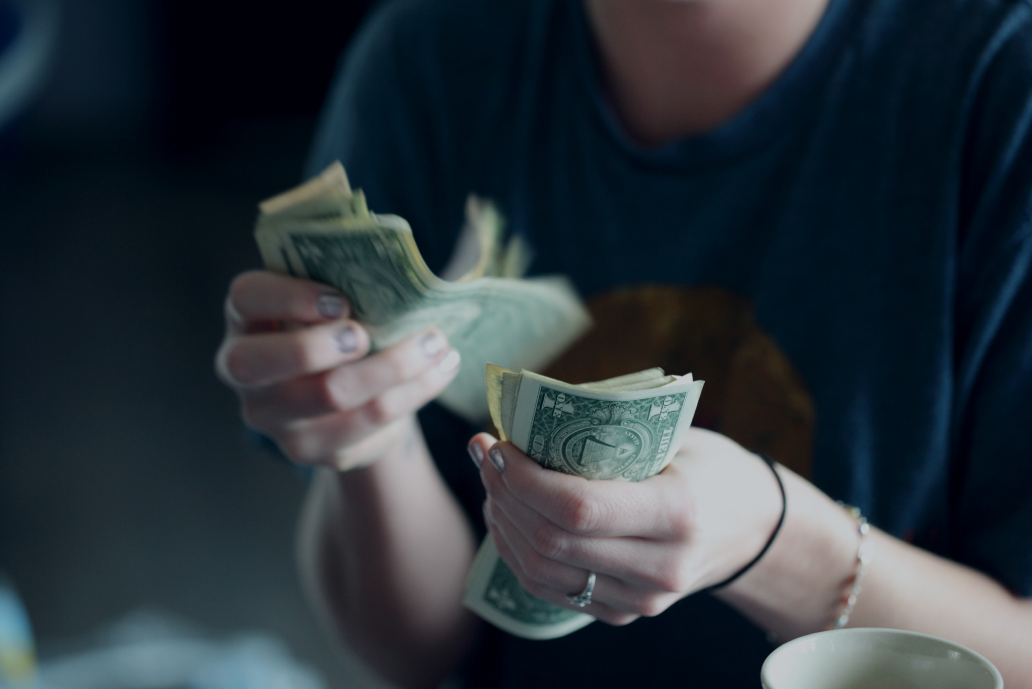 Person counting money